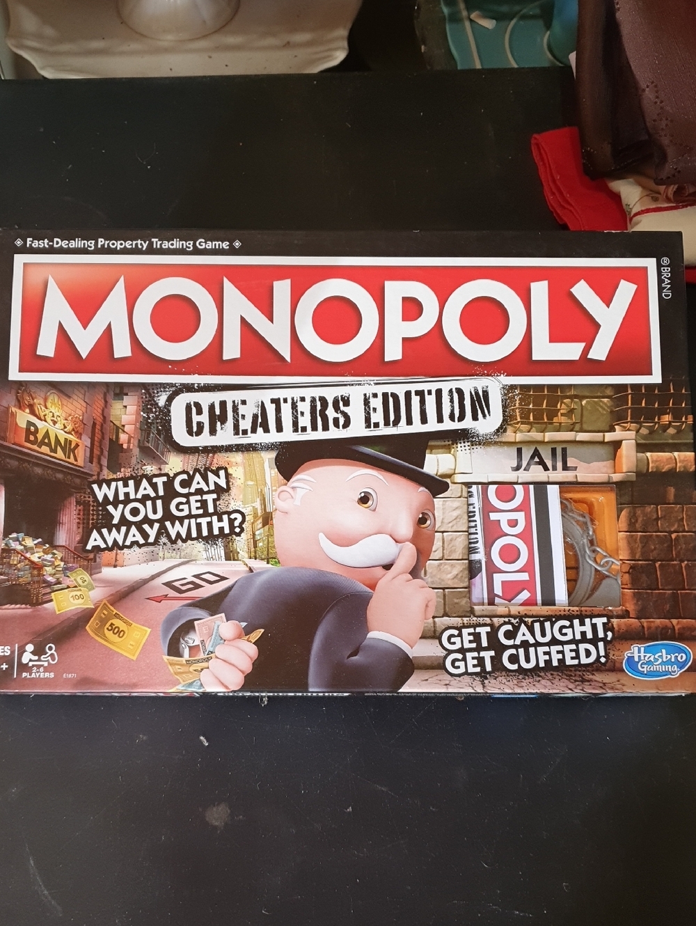 MONOPOLY Cheaters Edition Board Game - Red/White Box